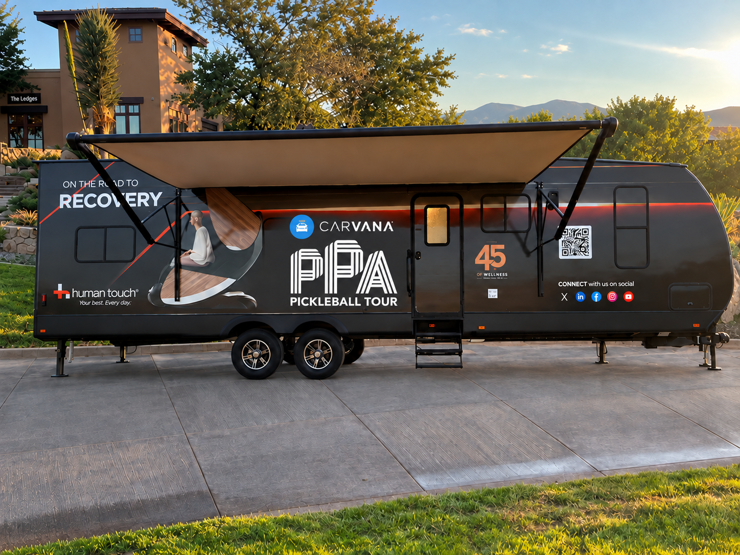 The Recharge, Relax, Recover lounge wrapped for the PPA Pickleball Tour, presented by Carvana and Human Touch